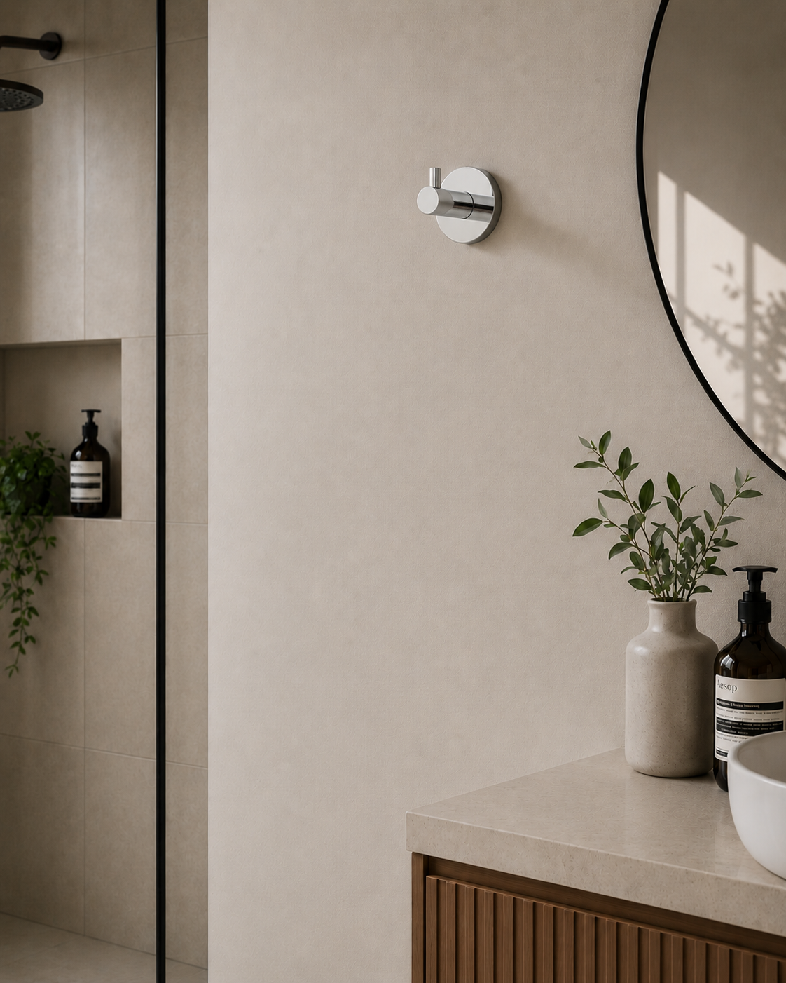 Bathroom interior with a mirror, countertop, and decorative elements.